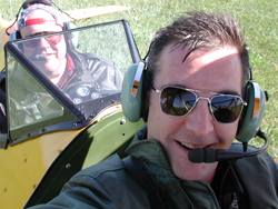 MLB and Rob Paulus in his Stearman
