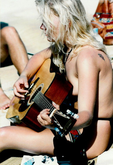 Nina - guitar on beach